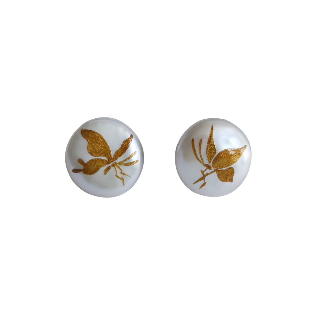 Pair of round earrings with gold butterfly design on a white background LacLume Hand-Painted Lacquer Earrings Baroque Pearl Gilded Butterfly