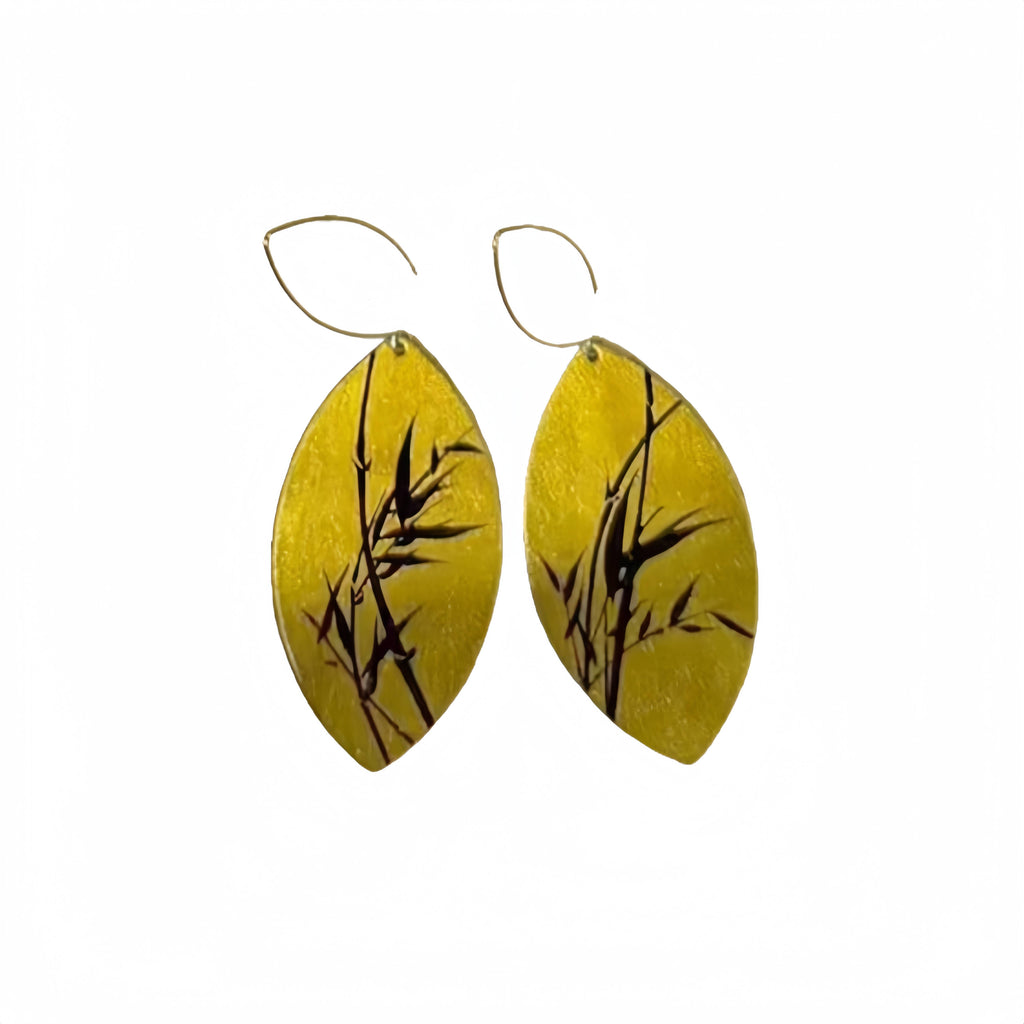 Yellow earrings with black bamboo design on a white background LacLume Hand-Painted Lacquer Jewelry Golden Autumn Bamboo Shadow for Fall Outfits