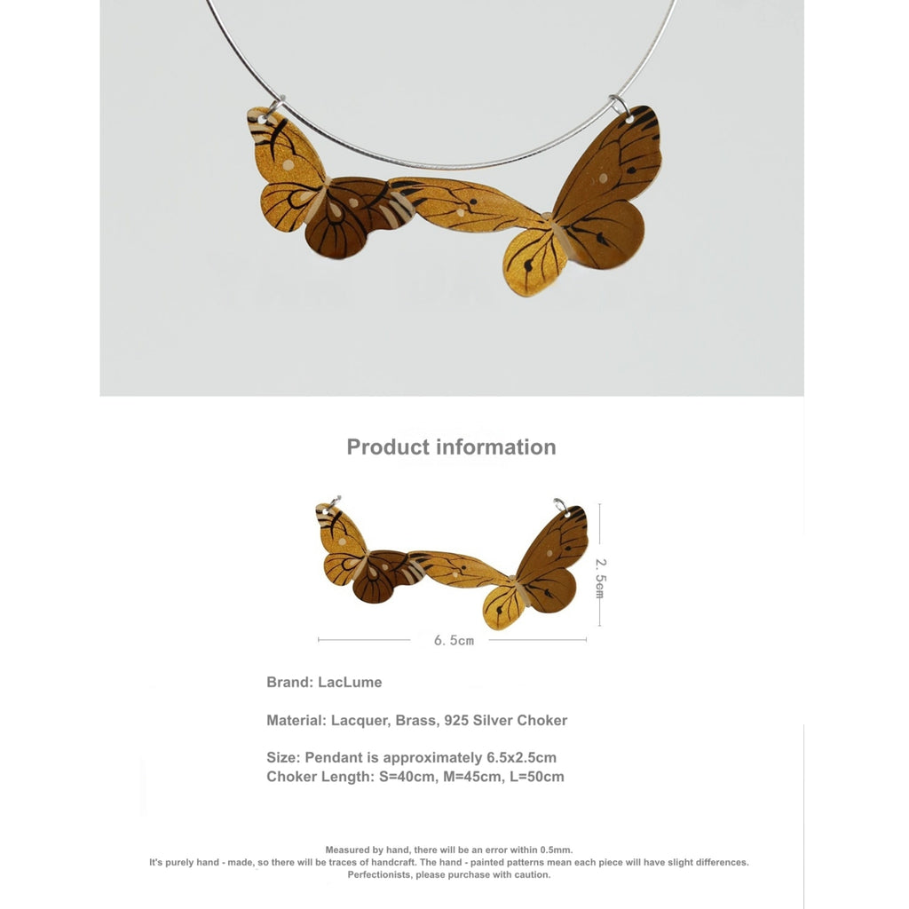 Butterfly-shaped necklace on a light gray background with product information text.