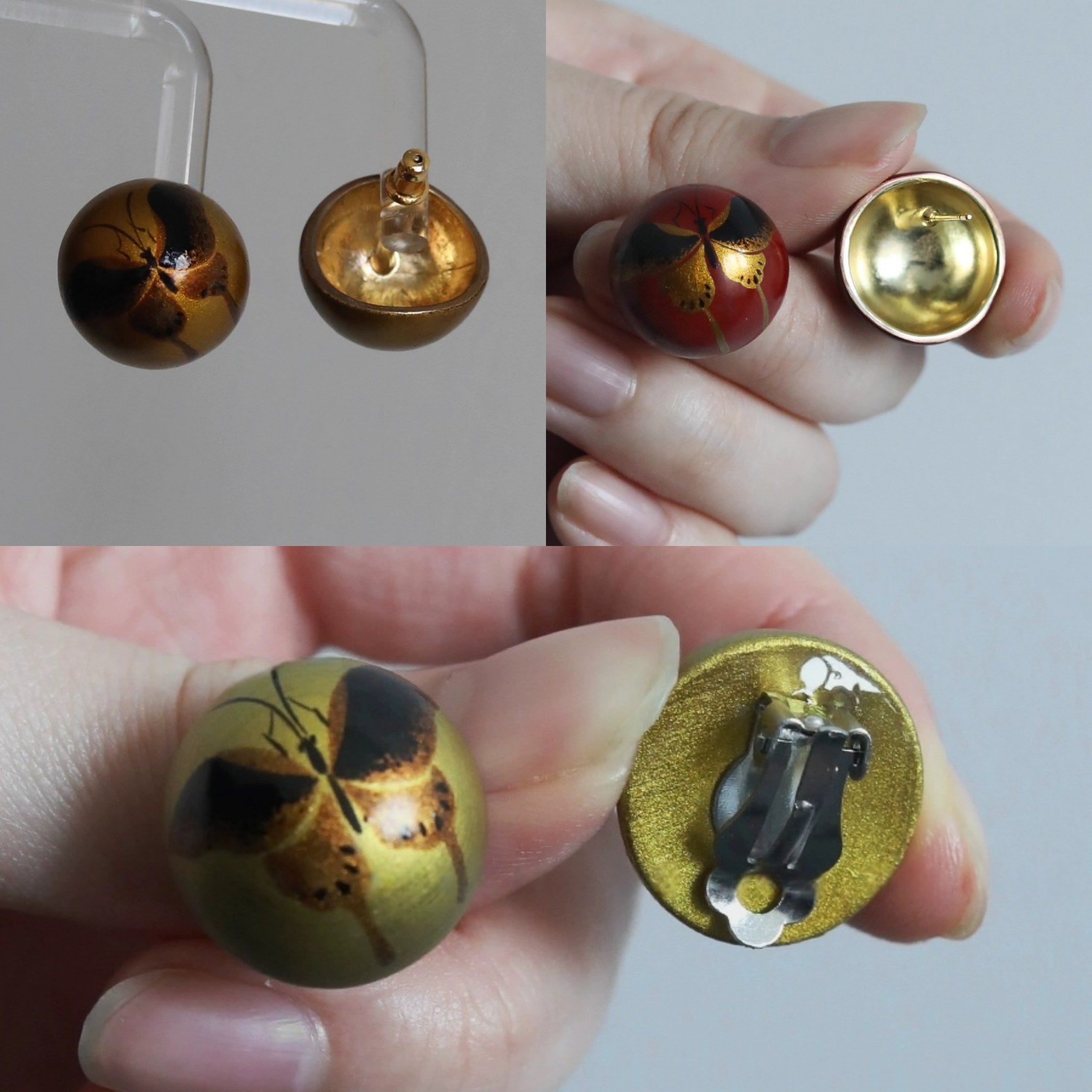Gold and red earrings with intricate designs held by a hand.