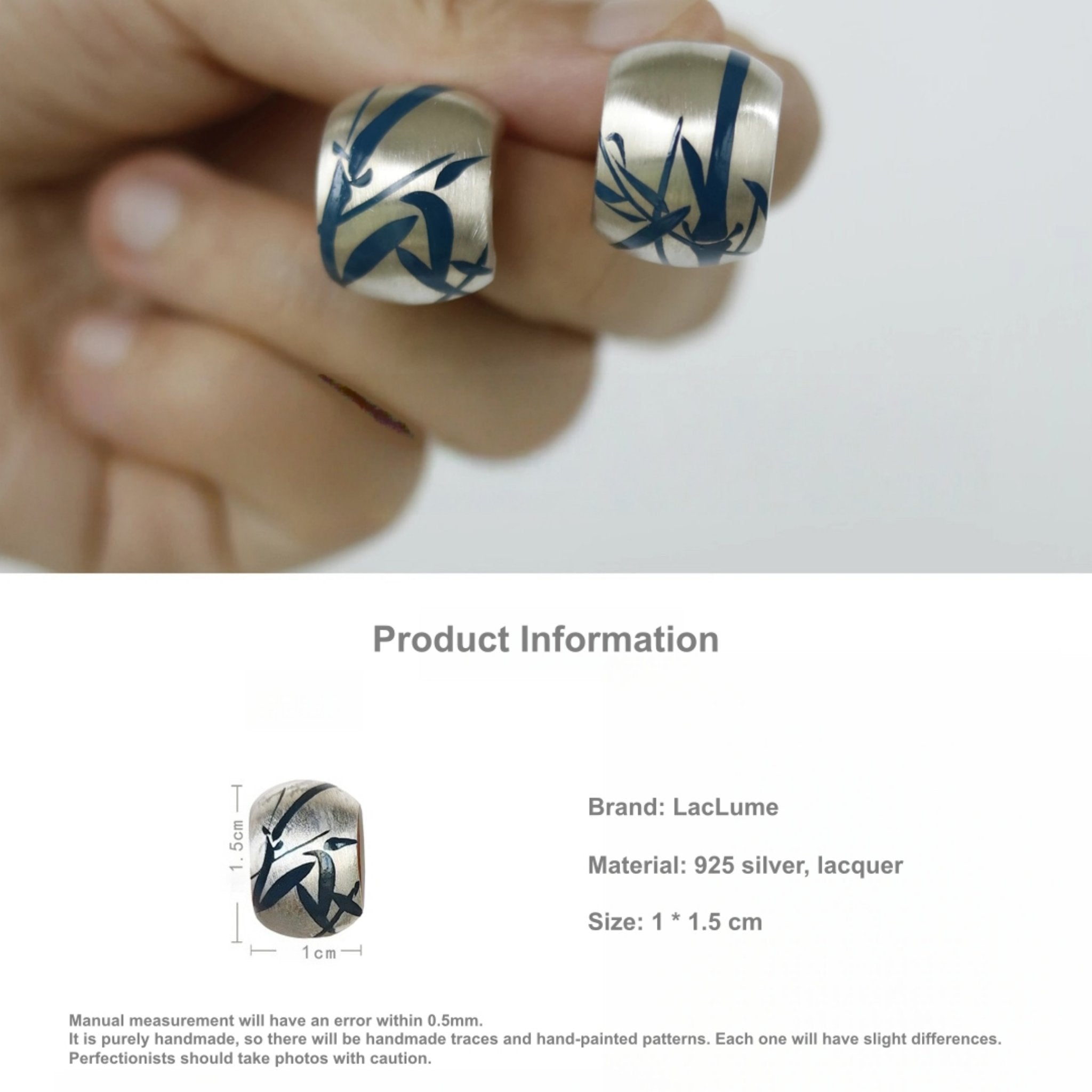 Silver rings with blue patterns on a hand, product information displayed below.