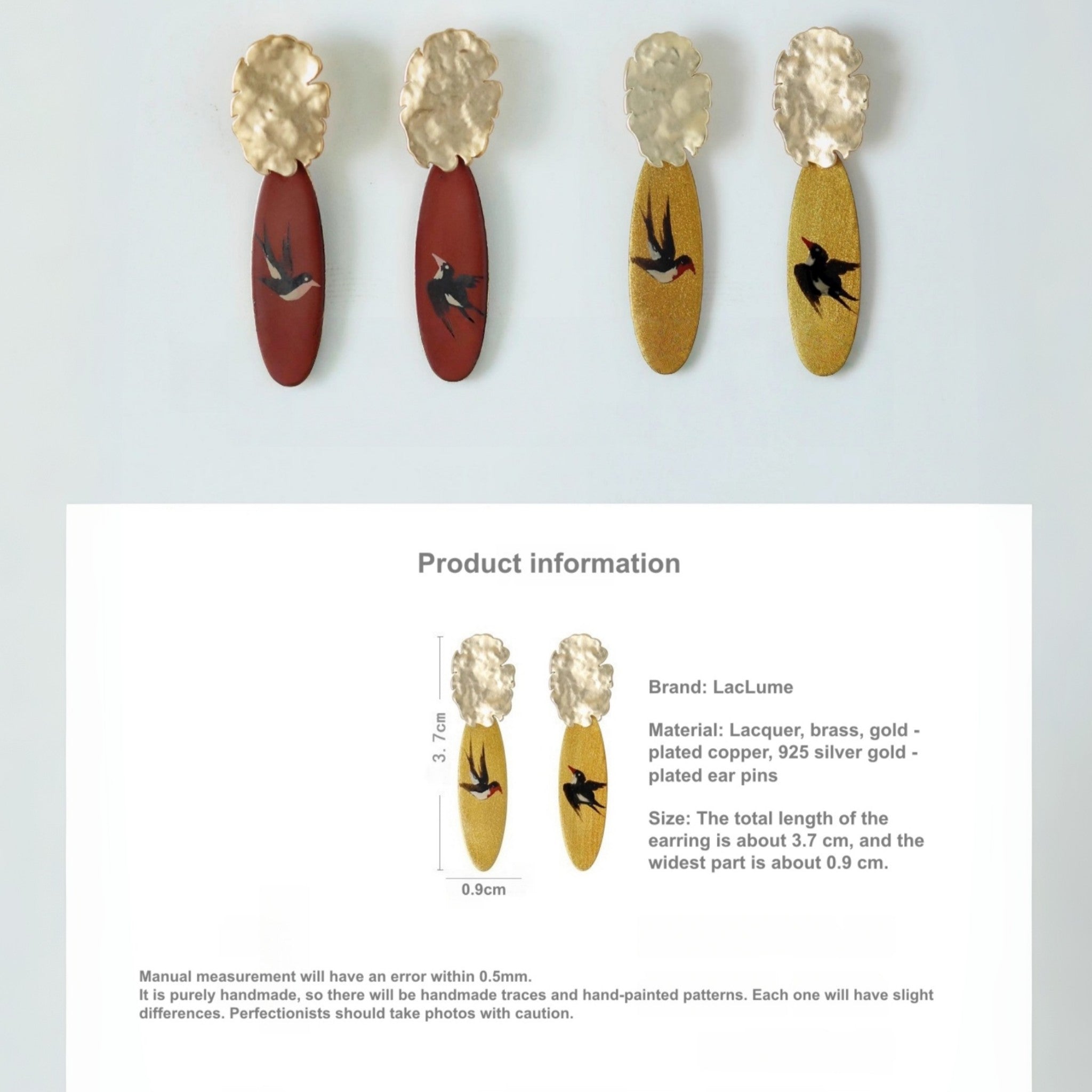 Pair of earrings with bird designs on a light gray background