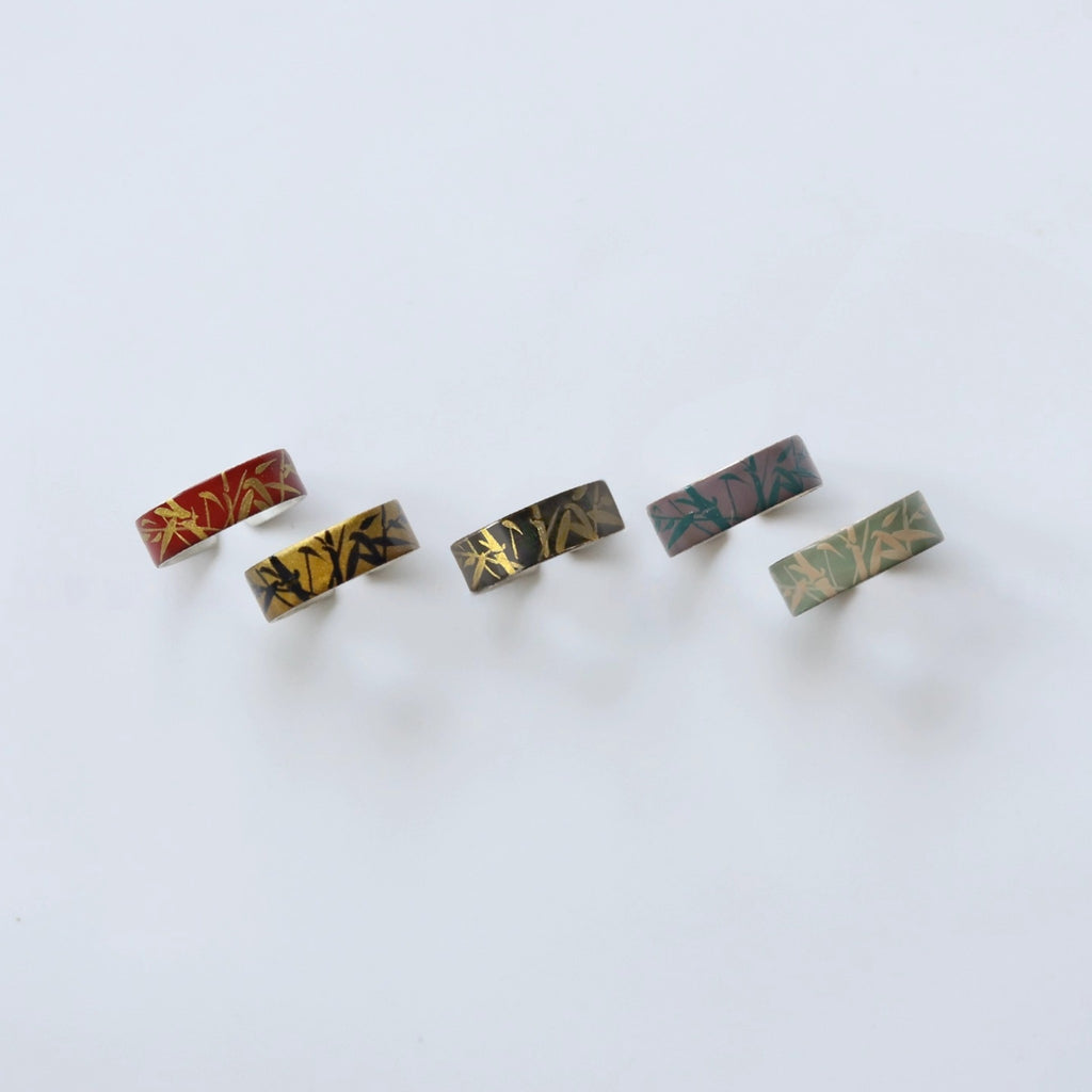 Five decorative hair clips with floral patterns on a white background LacLume HandPainted Lacquer Silver Ring Bamboo Pattern Handmade Silver Lacquerware