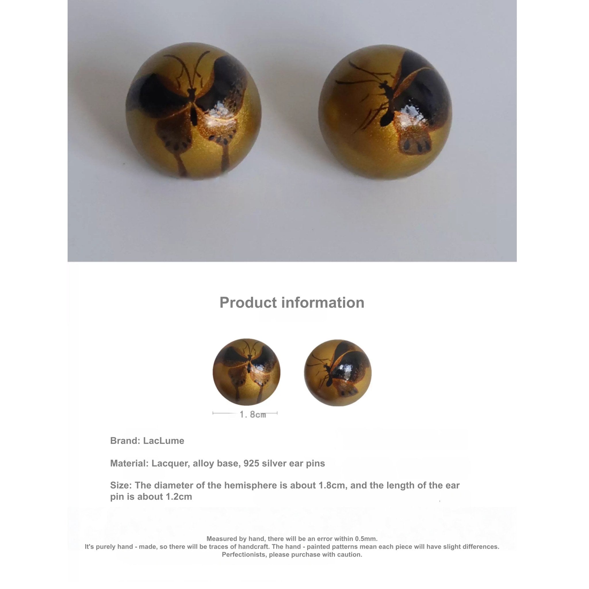 Pair of earrings with ant design on a white background